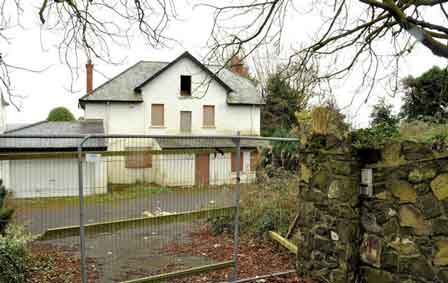 Vacant With Boarded Windows