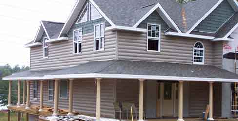 Note The Corners - Log Siding Over Frame Construction